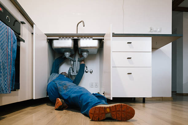 Professional Drain Cleaning technician working in Cromwell, KY